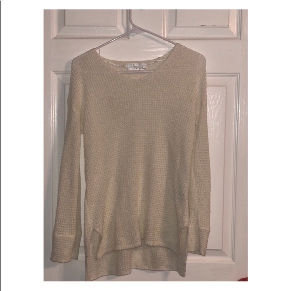 A cream colored sheer sweater. Never worn before. - Picture 2 of 3